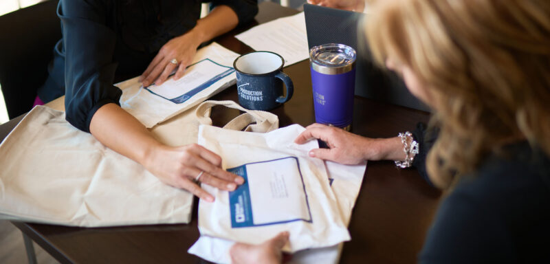 PS employees review mail packages