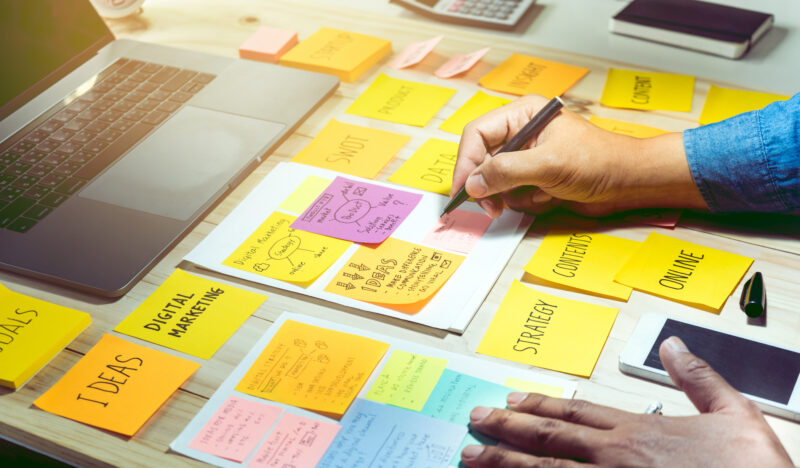 Brainstorming on colorful sticky notes